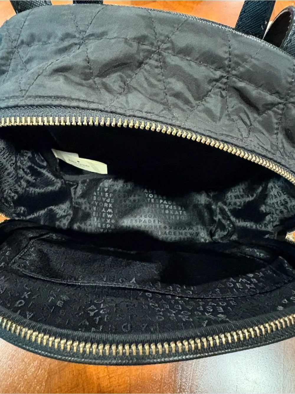 kate spade Black Quilted Med. Backpack, great condition